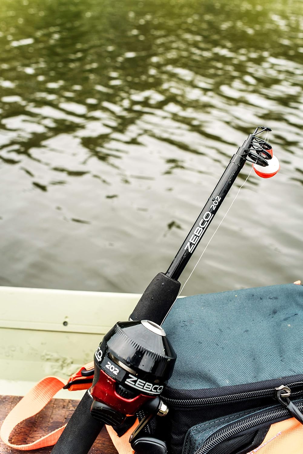 Spincast Reel and Telescopic Fishing Rod Combo, 17-Inch to 5-Foot 6-Inch Telescopic Fishing Pole, Size 30 Reel, Right-Hand Retrieve, Pre-Spooled with 10-Pound Line, Black/Red K457