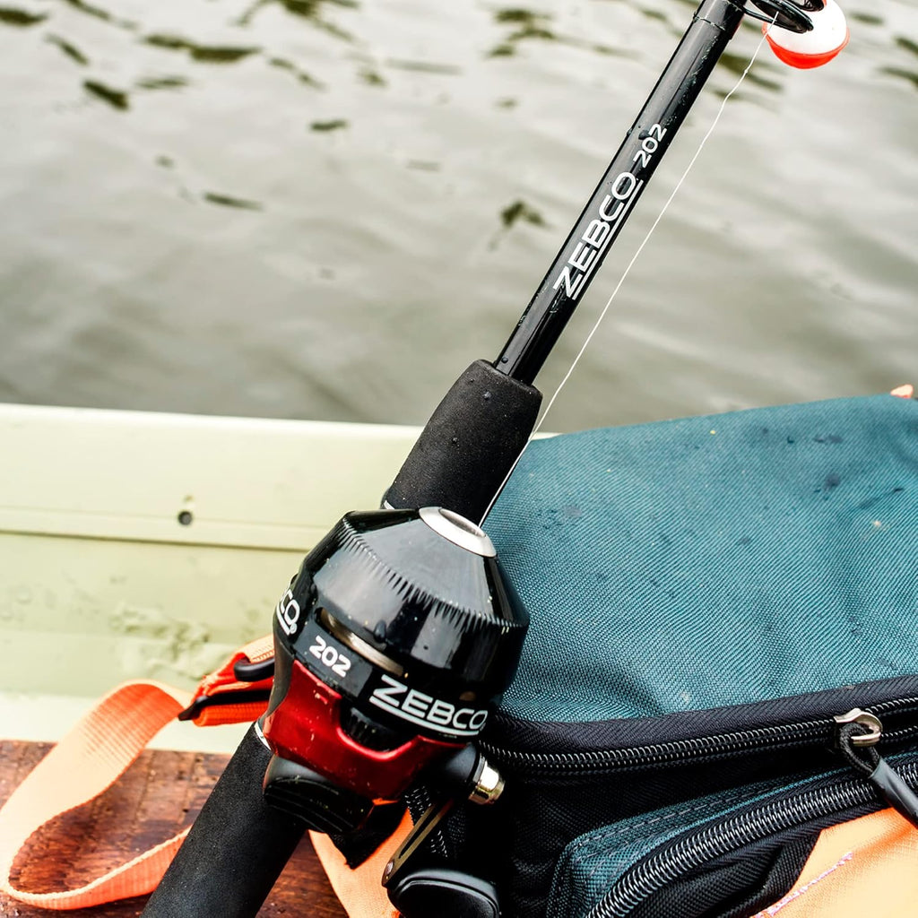 Spincast Reel and Telescopic Fishing Rod Combo, 17-Inch to 5-Foot 6-Inch Telescopic Fishing Pole, Size 30 Reel, Right-Hand Retrieve, Pre-Spooled with 10-Pound Line, Black/Red K457